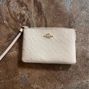 Coach Beige Embossed Wristlet